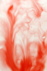 Abstract watercolor red background in water on white