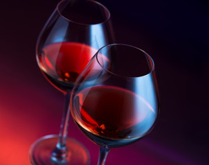 Two wineglasses angled