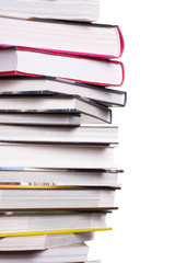 Books in pile on white background