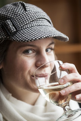 Young Woman Drinking White Wine