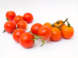 Cherry tomatoes isolated on white background