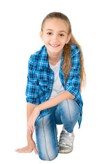 Fototapeta premium The girl in jeans and a checkered shirt