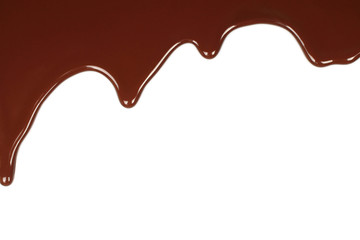 Melted chocolate dripping on white background .