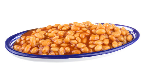 Marinated haricot beans in tomato sauce with shallots on a plate
