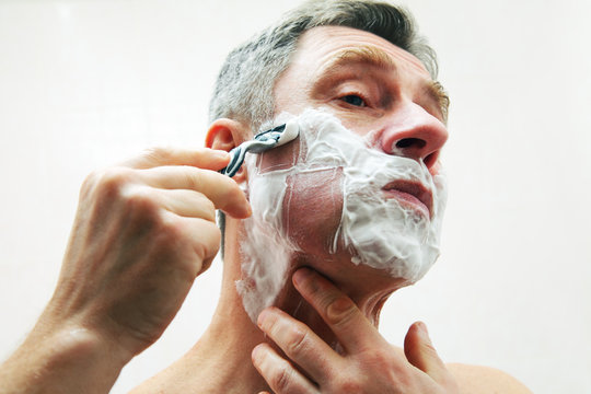 Image Of Mature Man Shaving