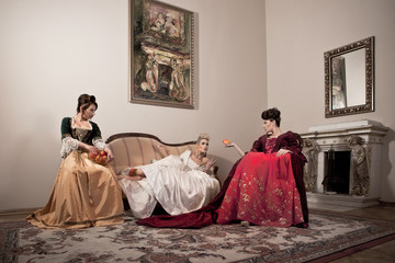 Beautiful girls in palace - baroque style