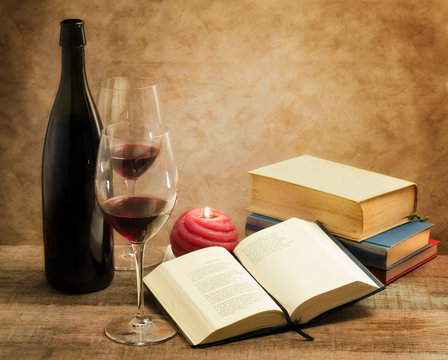 relaxing moments with novel books and pair of wine glass
