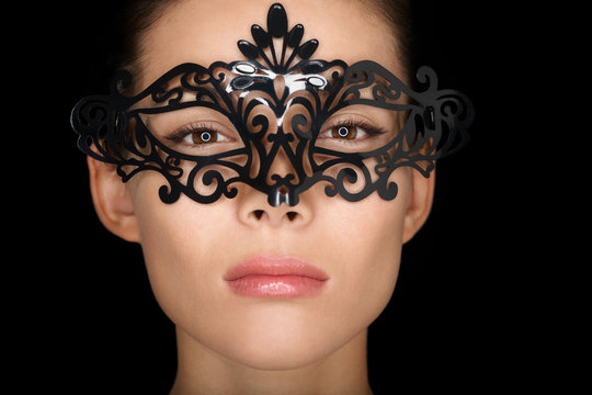 Mask. Beauty woman wearing carnival mask