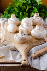 Mushrooms on a cutting Board with parsley