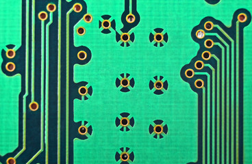 Close up of a printed green computer circuit board