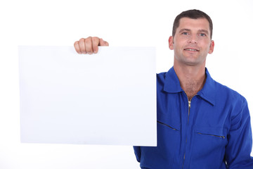 man showing a piece of paper