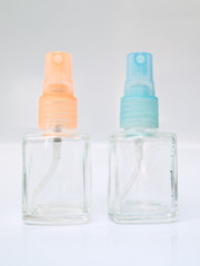 A glass spray bottle isolated on whited background