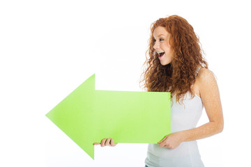 Excited woman holding an arrow pointing left