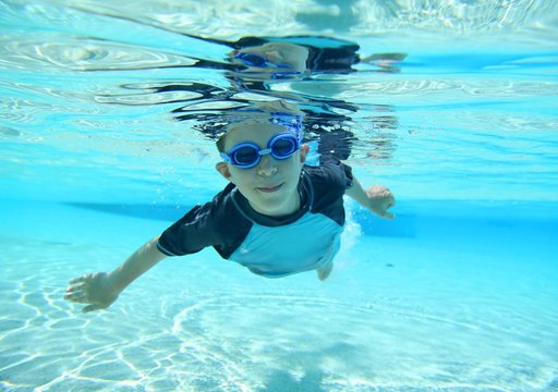 Boy swimming, underwater shot