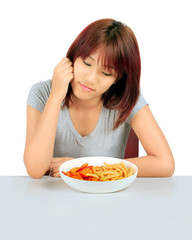 Isolated young asian woman with a plate of potato chips and fren