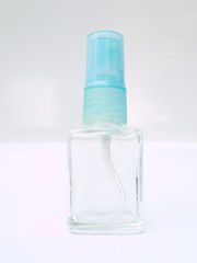 A glass spray bottle isolated on whited background