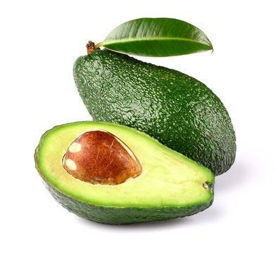 Fresh ripe avocado with leaf