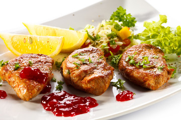 Grilled steaks and vegetables