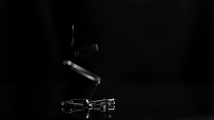 Safety pins crashing down and bouncing - Powered by Adobe