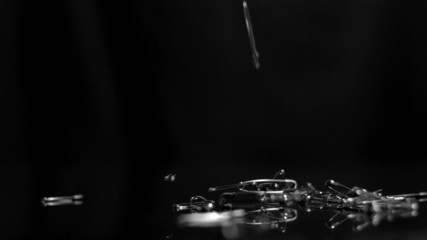 Safety pins crashing down - Powered by Adobe