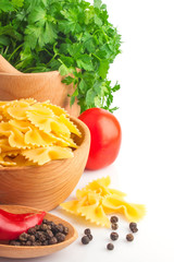 Pasta in bowl and vegetable