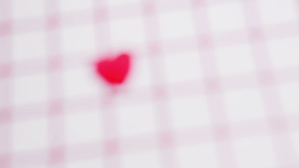 Pink heart marking out valentines day on calendar close up - Powered by Adobe