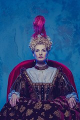 Her royal highness sitting on throne