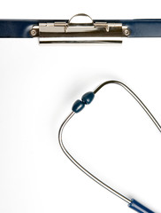 Fototapeta premium Stethoscope on empty document in a clipboard