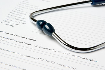 Stethoscope on medical document (medical questionnaire)