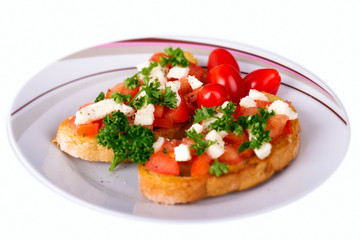 Bruschezza mit Schafskäse und Tomaten