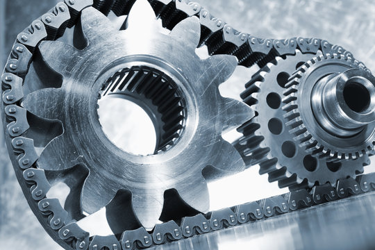 gears, chains and pinions, engineering concept in blue