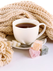 cup of tea with scarf isolated on white