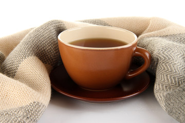 cup of tea with scarf isolated on white
