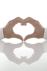 Fototapeta premium Heart shape of two hands