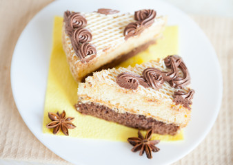 two pieces of cake on a white plate