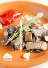 mushrooms fried with garlic and herbs
