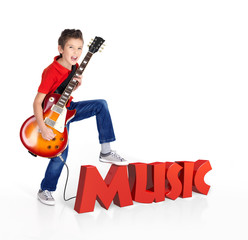 Boy plays on electric guitar with 3d text