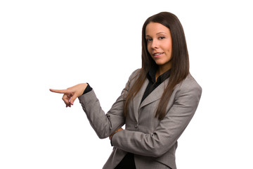 Business woman pointing at something on her side - obrazy, fototapety, plakaty