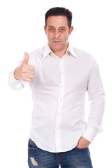 Fototapeta premium Portrait of a smiling handsome young man gesturing ok sign again
