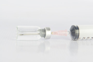 Closed up disposable syringe and medicine vial
