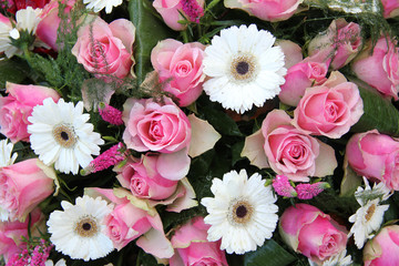 Pink roses, white gerberas in bridal arrangement