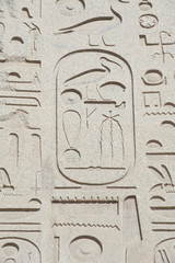 Egyptian hieroglyphic carvings on wall