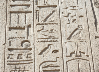 Egyptian hieroglyphic carvings on wall