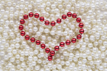 Red beads in the shape of a heart