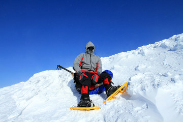 Winter hiking in snowshoes.