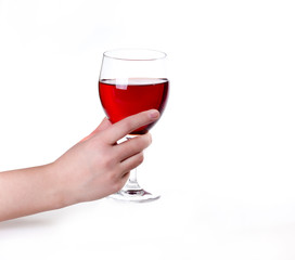 Hand with red wine glass on white background