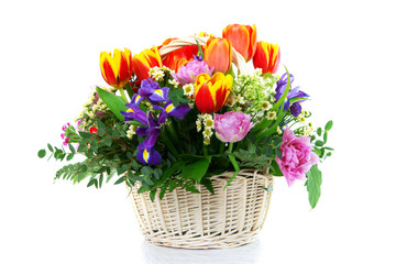 Fototapeta na wymiar Beautiful bouquet in wattled basket