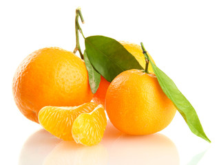 Ripe sweet tangerine with leaves, isolated on white