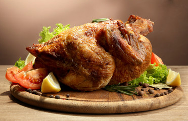 Whole roasted chicken with vegetables,
