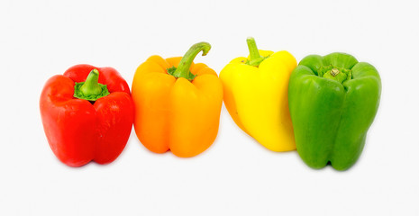 A mix of differently colored bell peppers isolated on white back